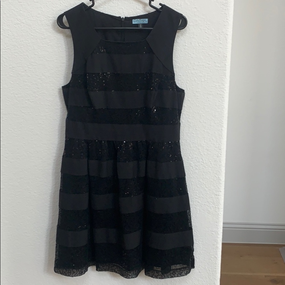 Black sequin A-line dress.